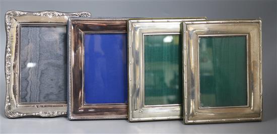 A pair of modern silver mounted photograph frames, Harrods Ltd, Sheffield, 1992/3 and two other modern silver frames,